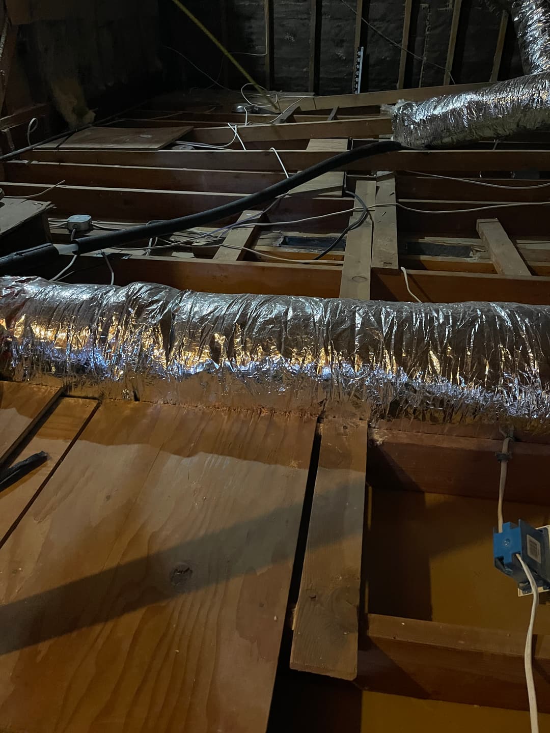 New air duct in an attic